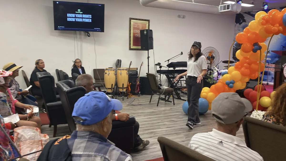 Attendees seated at a community workshop